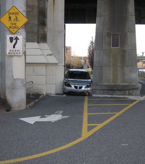 Car on bike path